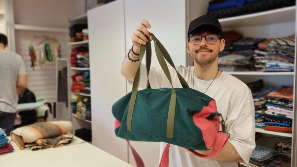 oliver holding bag